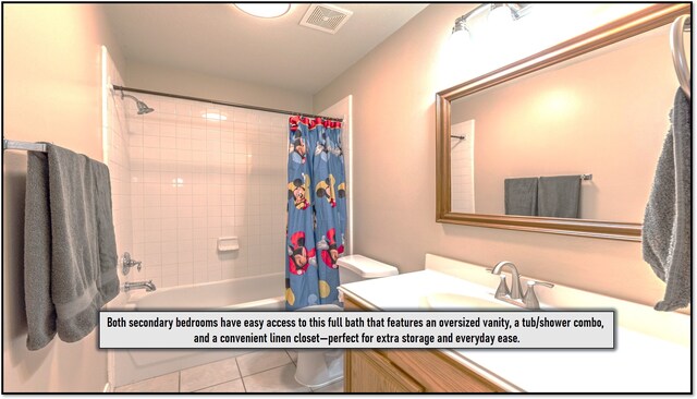 411 Senna Ave, League City, TX 77573 - full bath featuring shower / bathtub combination with curtain, vanity, visible vents, and toilet