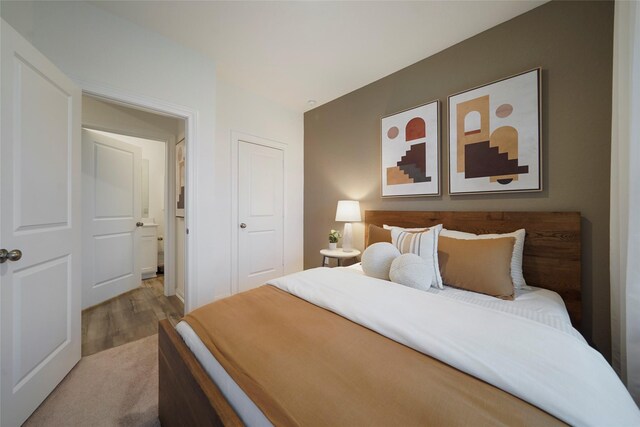 bedroom with light wood-style flooring