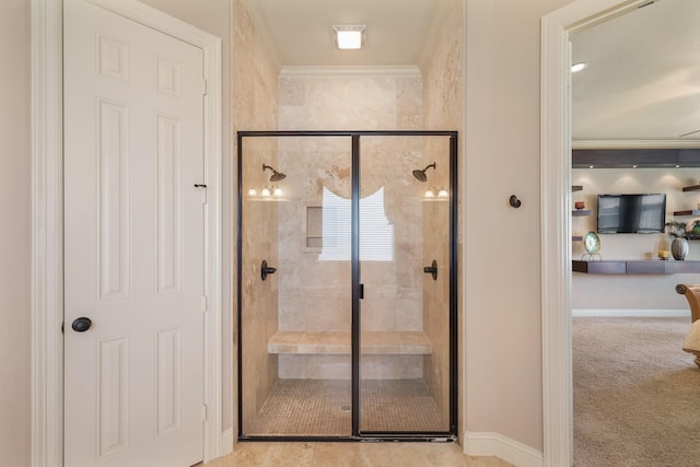 3203 Round Meadow Ln, Missouri City, TX 77459 - bathroom with a shower stall, crown molding, and baseboards