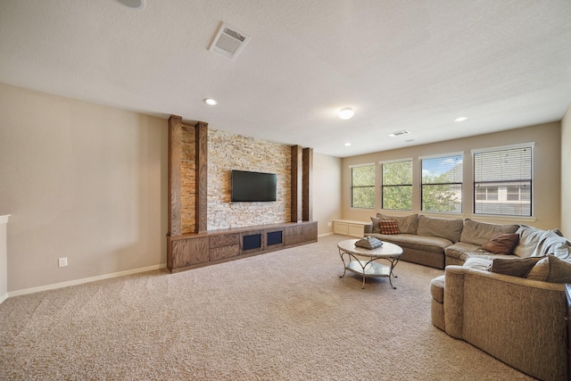 3203 Round Meadow Ln, Missouri City, TX 77459 - carpeted living room with a textured ceiling, baseboards, visible vents, and recessed lighting