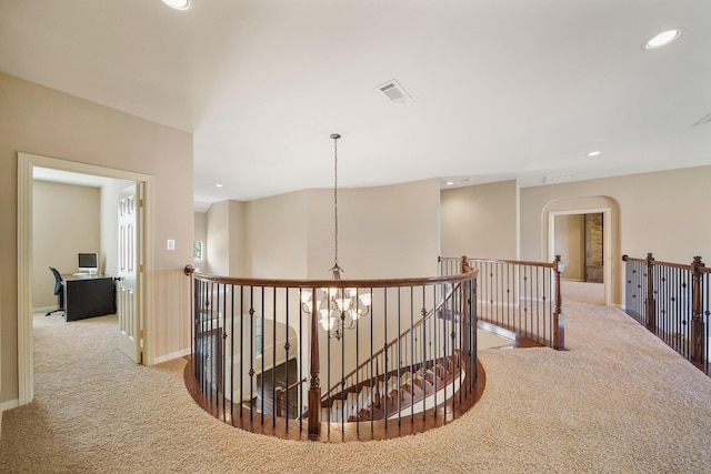 3203 Round Meadow Ln, Missouri City, TX 77459 - corridor featuring carpet, visible vents, recessed lighting, an upstairs landing, and a notable chandelier
