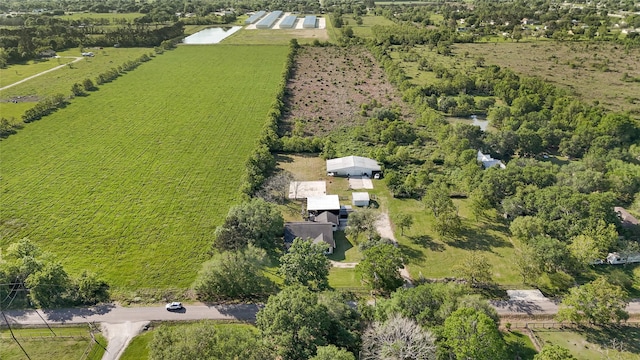 birds eye view of property featuring a rural view