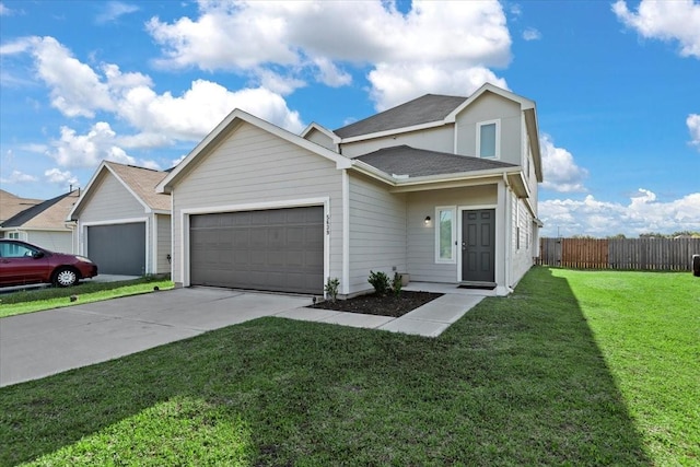view of front facade with roof with shingles, fence, a front lawn, an attached garage, and concrete driveway