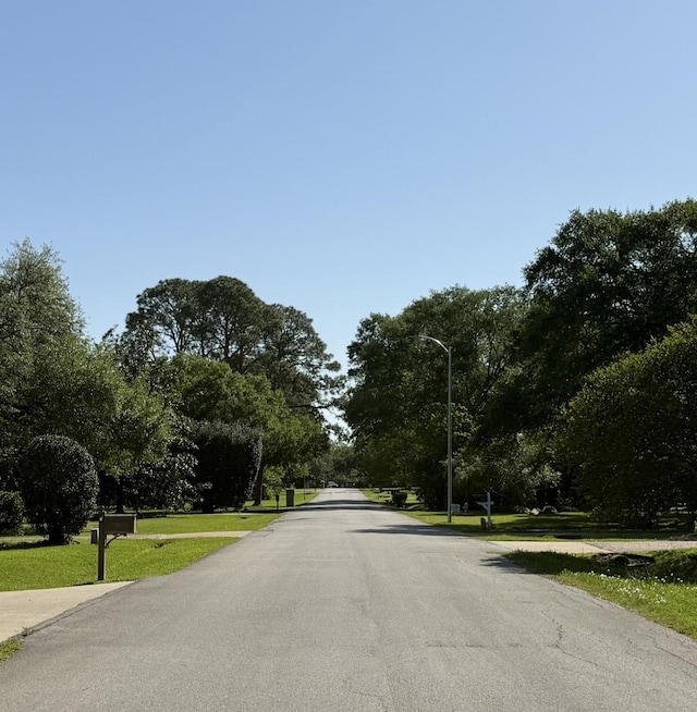 view of road featuring street lights