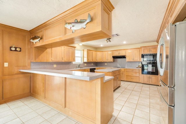 kitchen with light tile patterned floors, a peninsula, open shelves, black appliances, and under cabinet range hood