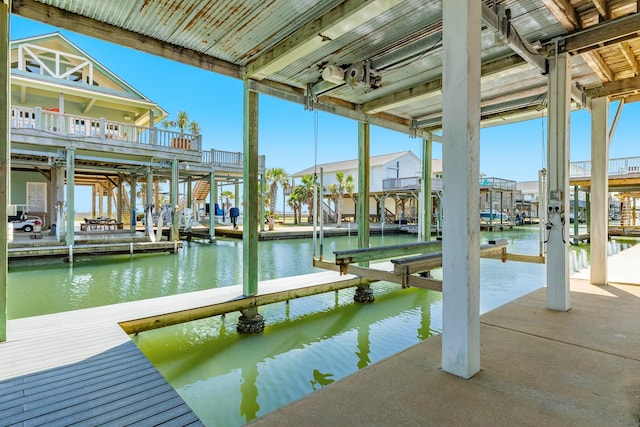 view of dock with a water view