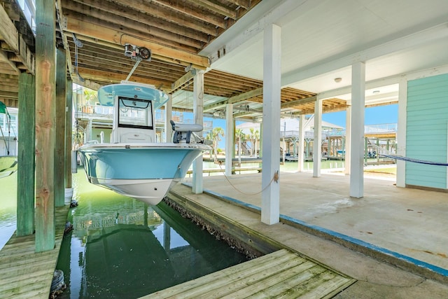 view of dock featuring boat lift
