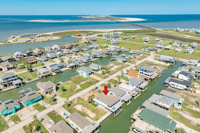 aerial view with a water view and a residential view