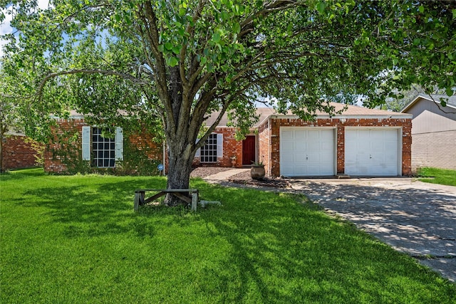 view of property hidden behind natural elements with brick siding, a front lawn, a garage, and concrete driveway