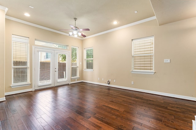 unfurnished room with a ceiling fan, crown molding, french doors, baseboards, and dark wood-style floors