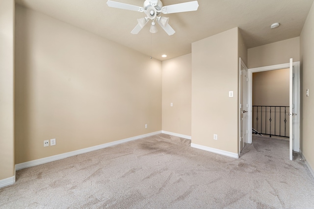 unfurnished bedroom with recessed lighting, ceiling fan, baseboards, and carpet
