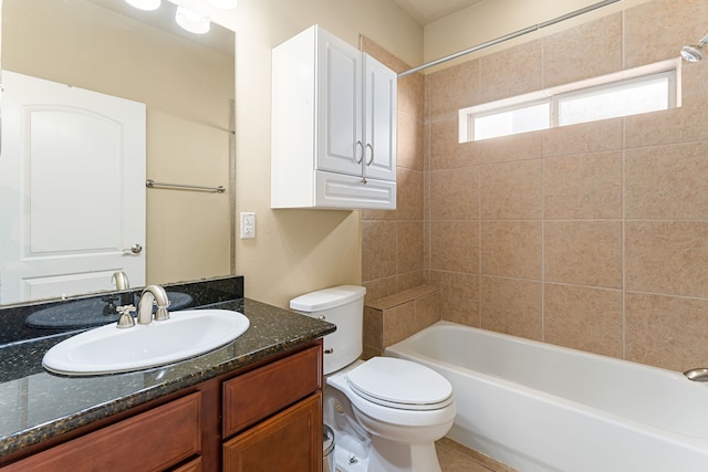 full bathroom featuring toilet, vanity, and shower / tub combination