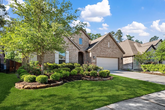 4290 Orchard Pass Dr, Spring, TX 77386 - traditional home featuring brick siding, concrete driveway, a garage, and a shingled roof