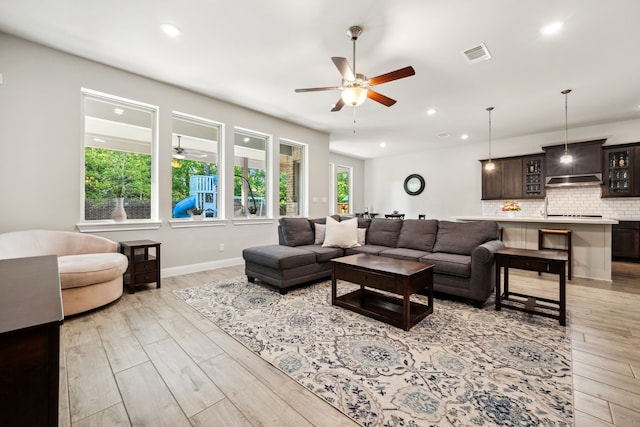 4290 Orchard Pass Dr, Spring, TX 77386 - living area featuring ceiling fan, light wood finished floors, recessed lighting, and baseboards