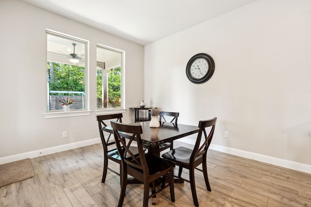 4290 Orchard Pass Dr, Spring, TX 77386 - dining area featuring light wood finished floors, baseboards, and ceiling fan