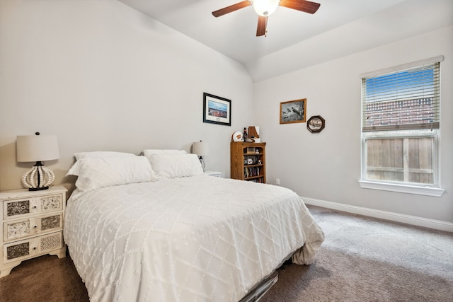4290 Orchard Pass Dr, Spring, TX 77386 - carpeted bedroom with baseboards, lofted ceiling, and ceiling fan