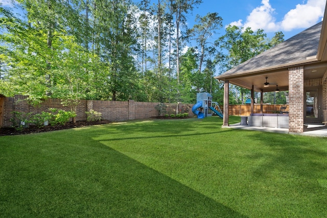 4290 Orchard Pass Dr, Spring, TX 77386 - view of yard with a playground, ceiling fan, and a patio area