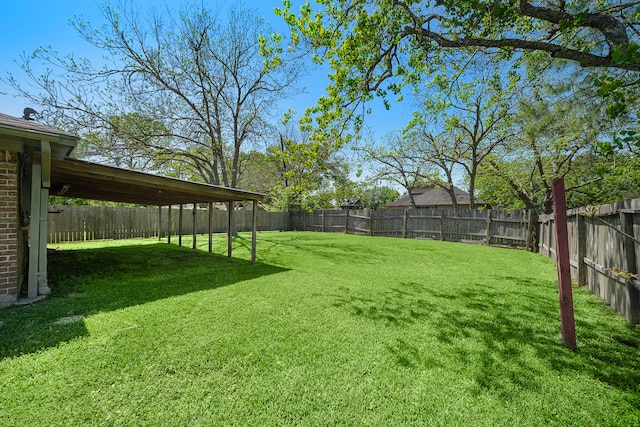 view of yard featuring a fenced backyard