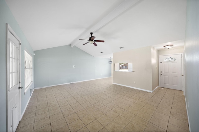 unfurnished living room featuring light tile patterned flooring, ceiling fan, vaulted ceiling with beams, and baseboards