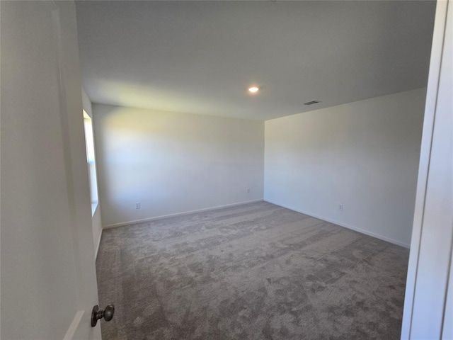 12426 Lady Slipper Rd, Houston, TX 77038 - carpeted empty room featuring baseboards and recessed lighting