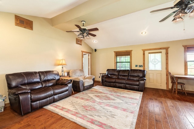 living room with a ceiling fan, a healthy amount of sunlight, vaulted ceiling, and wood-type flooring