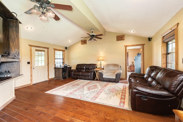 living area featuring vaulted ceiling, a ceiling fan, wood finished floors, baseboards, and recessed lighting