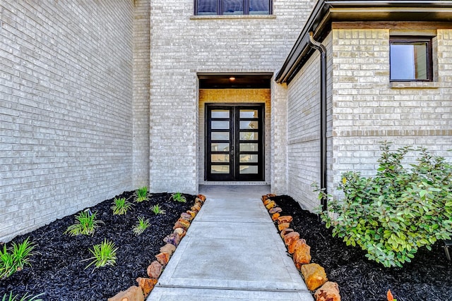 7606 Redwoods Forest Dr, Katy, TX 77493 - property entrance featuring french doors and brick siding