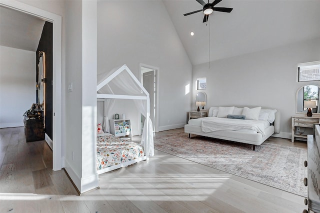 7606 Redwoods Forest Dr, Katy, TX 77493 - bedroom with high vaulted ceiling, recessed lighting, baseboards, and wood finished floors