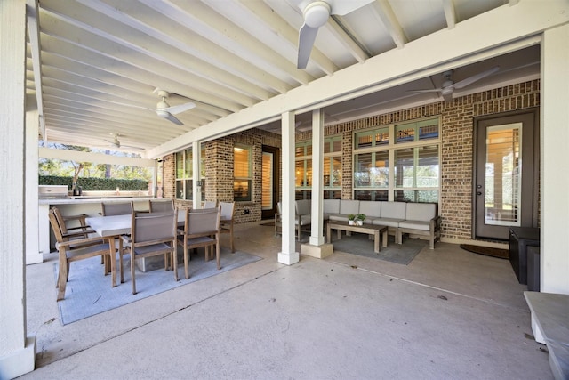 view of patio / terrace with outdoor lounge area, outdoor dining space, and ceiling fan