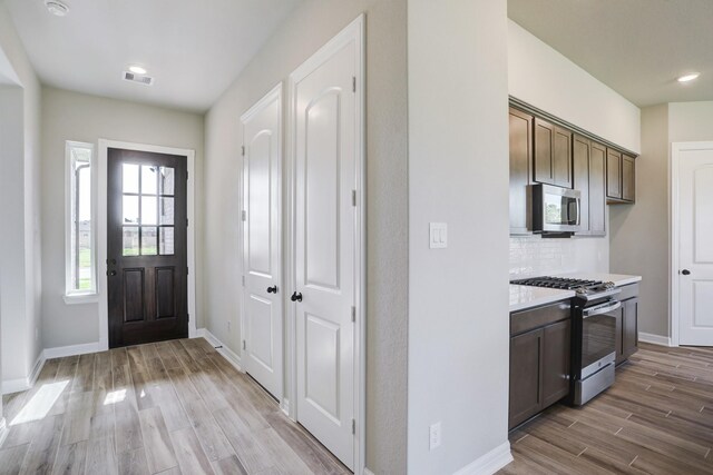 1613 Mija Park Rd, Seabrook, TX 77586 - interior space with visible vents, baseboards, light wood-type flooring, and recessed lighting