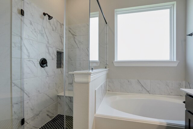 1613 Mija Park Rd, Seabrook, TX 77586 - bathroom featuring a tile shower, a bath, and vanity