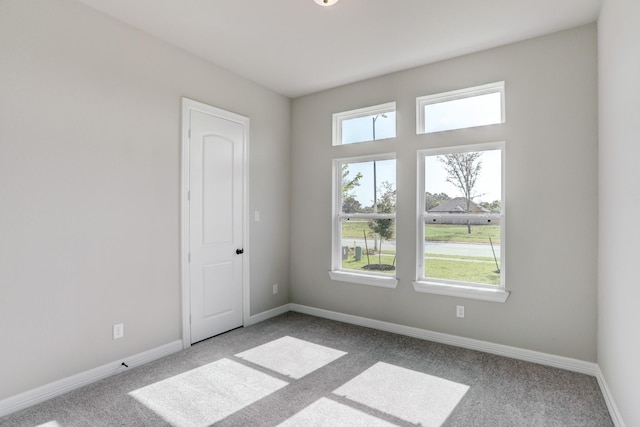 1613 Mija Park Rd, Seabrook, TX 77586 - carpeted spare room featuring baseboards