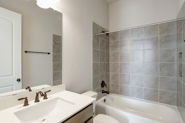 1613 Mija Park Rd, Seabrook, TX 77586 - bathroom featuring a textured wall, bathing tub / shower combination, vanity, and toilet