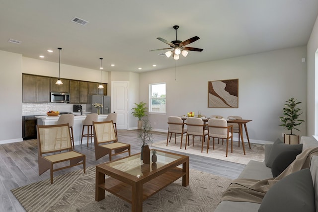 1613 Mija Park Rd, Seabrook, TX 77586 - living room with visible vents, baseboards, a ceiling fan, and recessed lighting