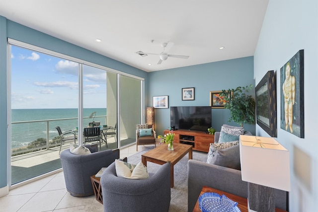 tiled living area featuring ceiling fan, visible vents, and recessed lighting