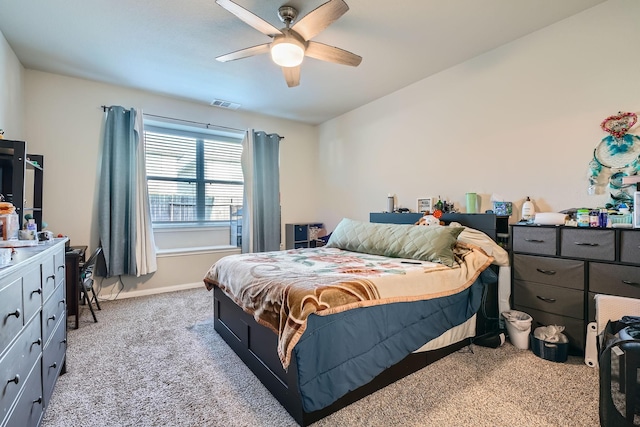 25639 Brooklyn Ln, Porter, TX 77365 - bedroom with light carpet, ceiling fan, baseboards, and visible vents