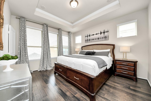 3119 Longleaf Meadows Dr, Houston, TX 77063 - bedroom featuring a raised ceiling, crown molding, dark wood finished floors, and baseboards