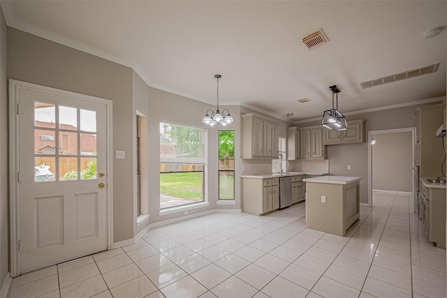 215 Wood Circle Ln, Houston, TX 77015 - kitchen featuring dishwasher, light countertops, a sink, a kitchen island, and baseboards