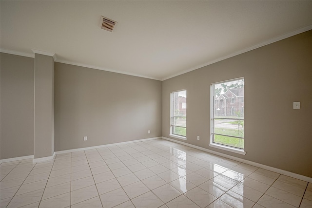 215 Wood Circle Ln, Houston, TX 77015 - empty room featuring light tile patterned flooring, baseboards, and ornamental molding