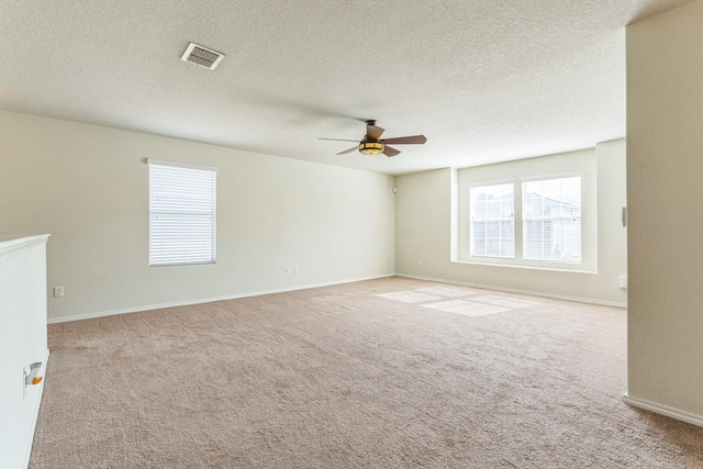 315 Prato Brezza, San Antonio, TX 78253 - spare room with ceiling fan, carpet floors, a textured ceiling, and baseboards