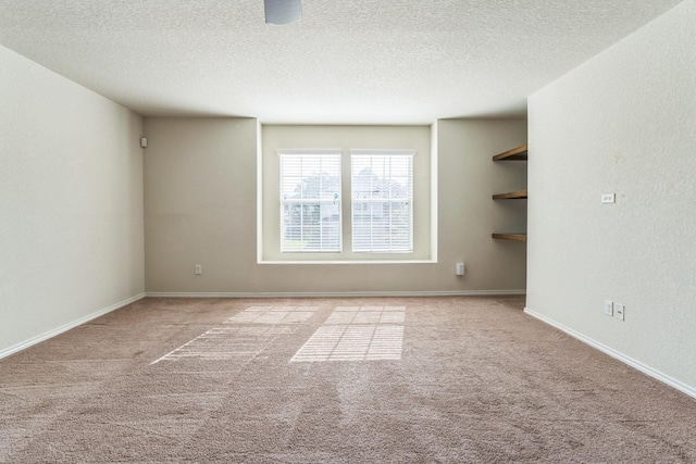315 Prato Brezza, San Antonio, TX 78253 - unfurnished room featuring carpet floors, a textured ceiling, and baseboards