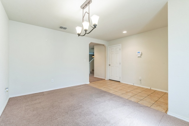 315 Prato Brezza, San Antonio, TX 78253 - unfurnished room featuring arched walkways, light carpet, light tile patterned floors, baseboards, and recessed lighting