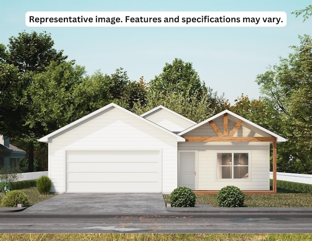 25759 Hickory Ln, Splendora, TX 77372 - view of front of property with a garage and driveway