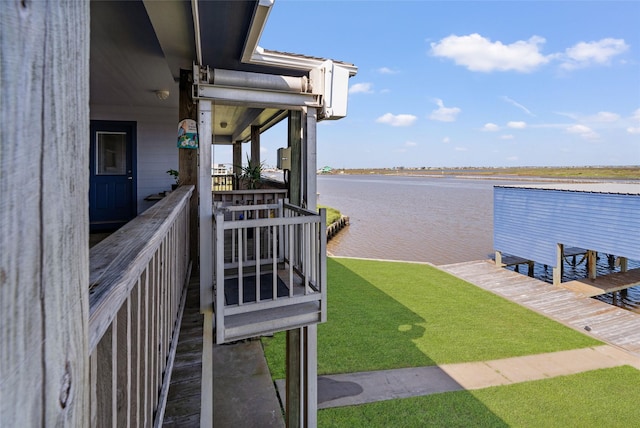 dock area with a water view