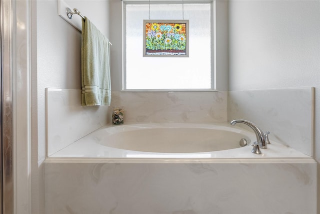 full bathroom featuring a garden tub