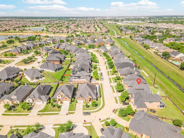 19810 Quarry Stone Ln, Richmond, TX 77407 - drone / aerial view with a residential view and a water view