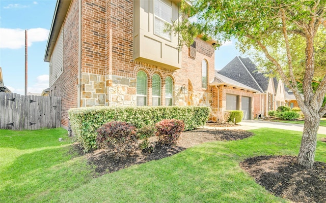 19810 Quarry Stone Ln, Richmond, TX 77407 - exterior space with fence, a garage, and concrete driveway