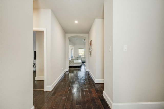 19810 Quarry Stone Ln, Richmond, TX 77407 - corridor with wood-type flooring, baseboards, recessed lighting, and arched walkways