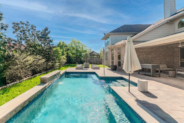 view of pool with a patio, fence, and a fenced in pool