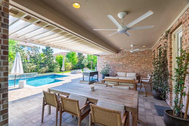 view of patio / terrace featuring an outdoor hangout area, outdoor dining area, ceiling fan, and an outdoor pool